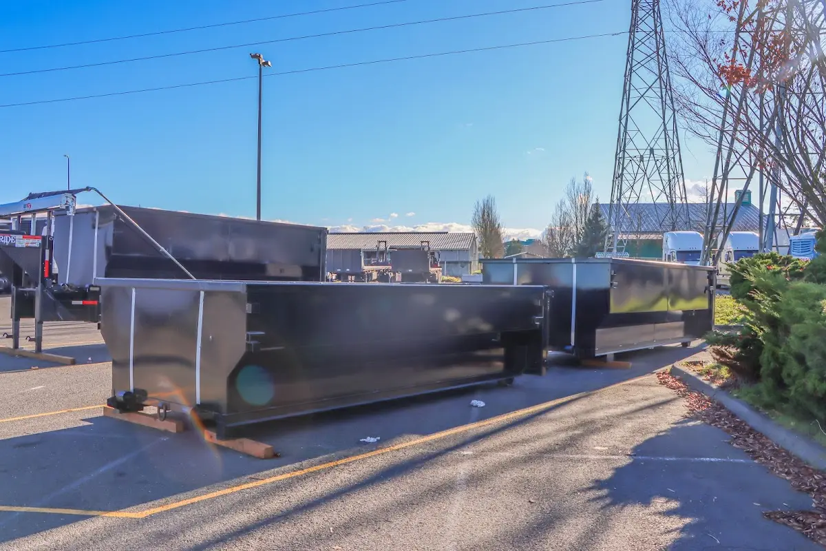 Roll-off dumpster ready for waste disposal at job site for 3 Yard Dumpster Rental in Dawsonville
